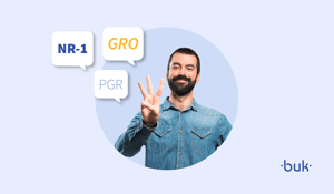 Profissional apontando para os termos NR-1, GRO e PGR em destaque, representando gestão de riscos ocupacionais e segurança do trabalho no RH.